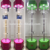 Custom Design Free Standing In Store Marketing Led Lighting Rotating Oval Round Acrylic Glass Display Cabinet